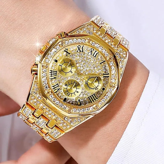 This diamond gold bracelet watch for women is a stunning accessory that combines luxury and elegance. Featuring a beautiful gold-tone finish, it is adorned with sparkling diamonds that add a touch of glamour. The bracelet design provides a comfortable fit and complements any outfit, making it perfect for both casual and formal occasions.